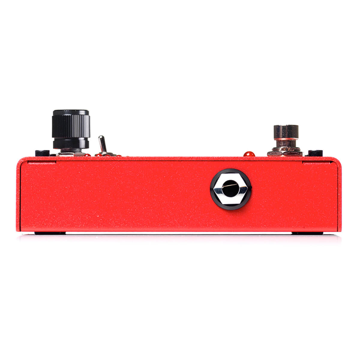 Red FX pedal with a large black knob, a small toggle switch, a metal footswitch, and a single quarter-inch jack on the front side.