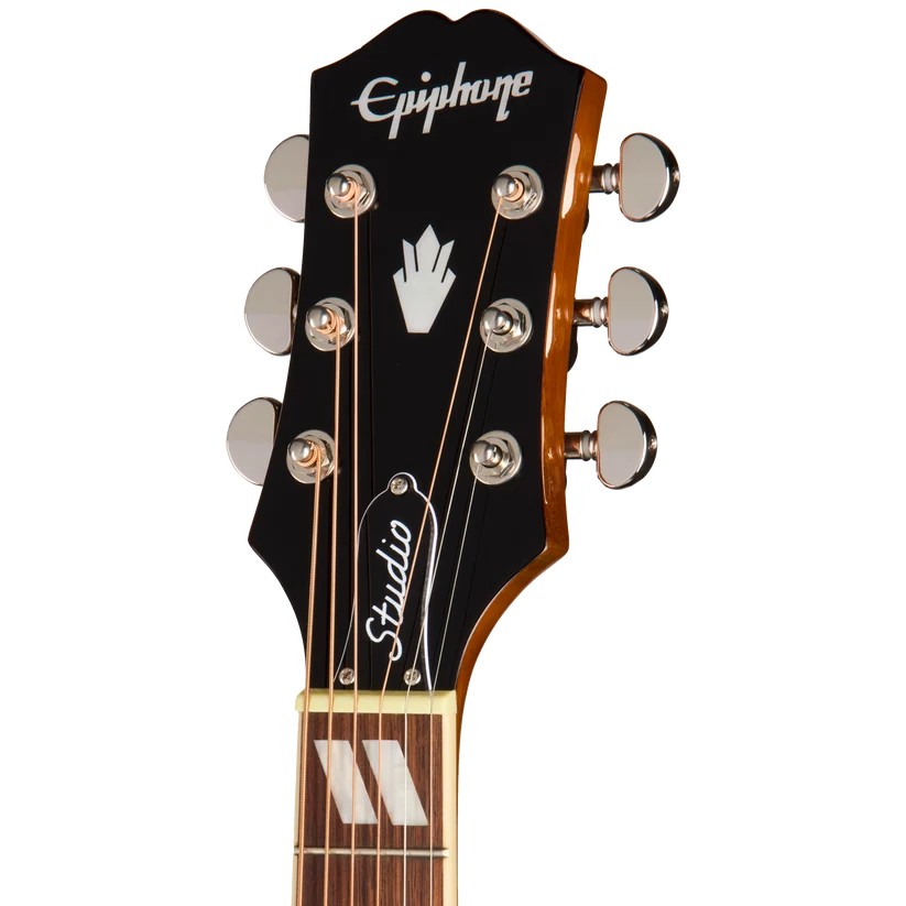 Tête d’une guitare acoustique Epiphone noire, six mécaniques argentées, logo Epiphone et inscription « Studio » en blanc.