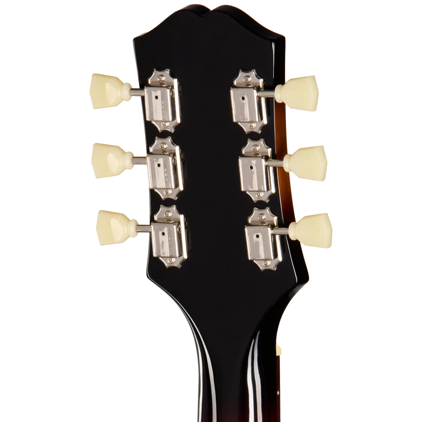 Six tuning pegs with cream knobs are mounted on the glossy black headstock of an acoustic guitar, viewed from the back.