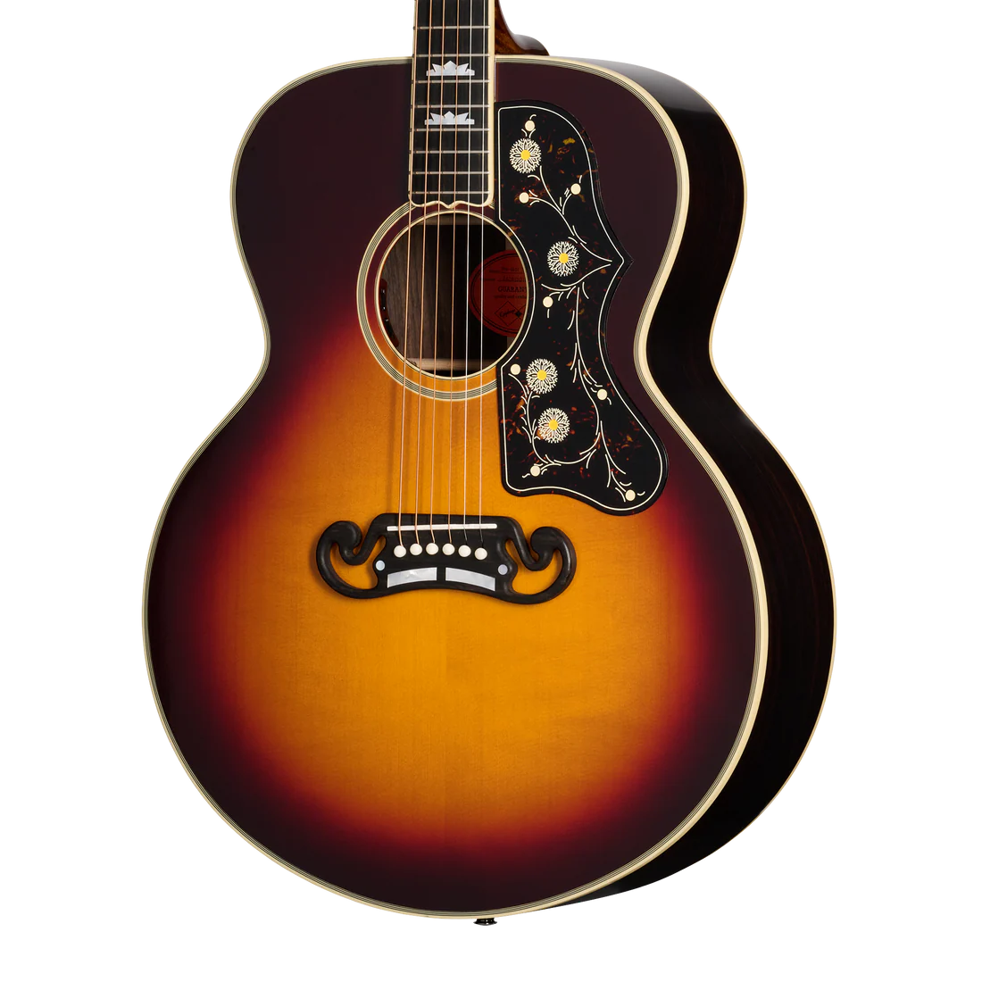 Sunburst acoustic guitar with floral pickguard, white trim, ornate bridge, and mother-of-pearl inlays on the fretboard.