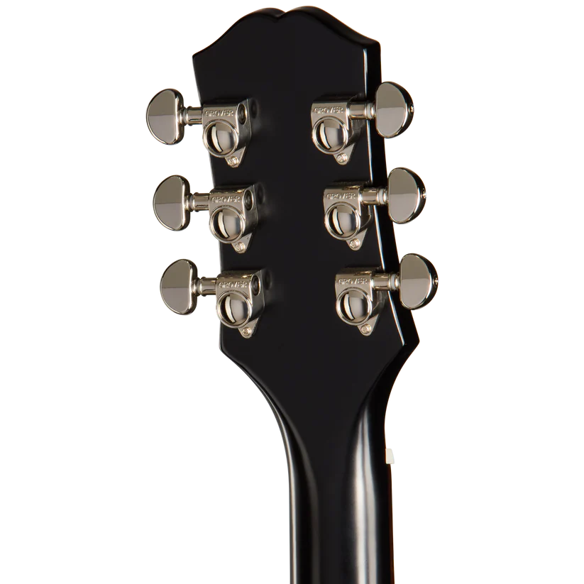 Six silver tuning pegs on the back of a glossy black acoustic guitar headstock, three on each side, with a curved top edge.