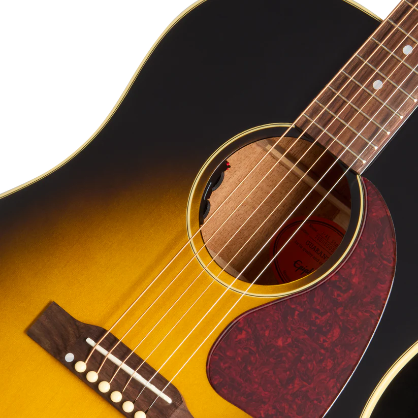 Sunburst acoustic guitar with a dark-to-yellow gradient, tortoiseshell pickguard, six strings, and circular sound hole.