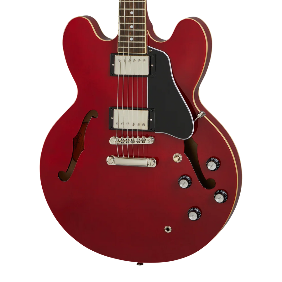 Red electric guitar with a semi-hollow body, dual humbucker pickups, four black control knobs, and f-shaped sound holes.
