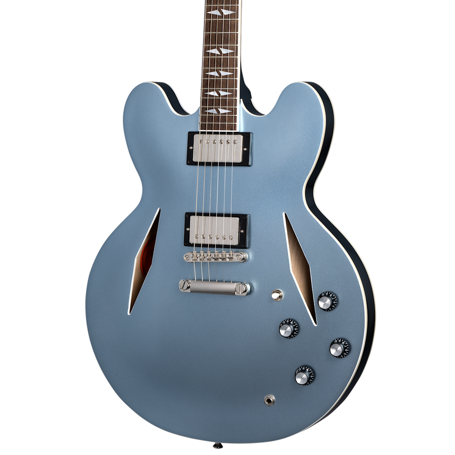 Semi-hollow electric guitar in metallic blue with two humbucker pickups, four control knobs, and f-shaped sound holes.
