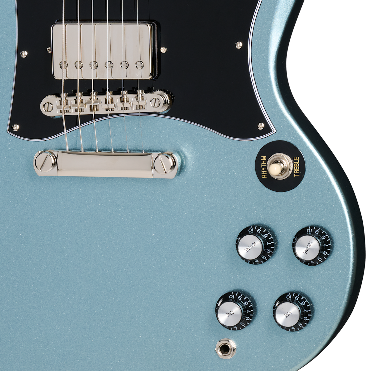 Metallic blue electric guitar body with four black control knobs, a black pickguard, toggle switch labeled rhythm and treble, and silver bridge hardware.