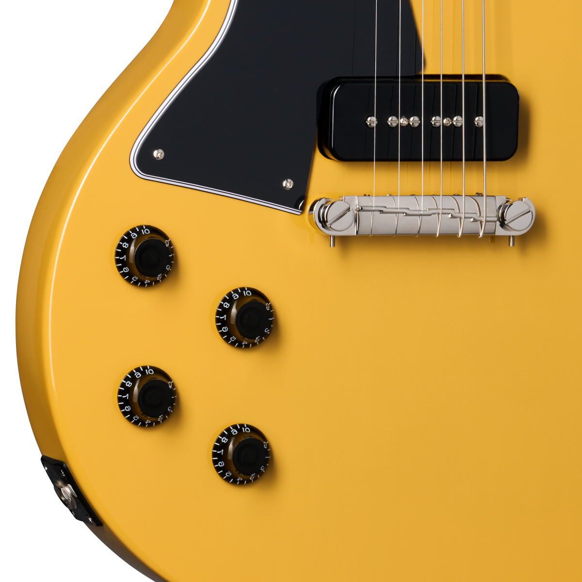 Yellow Epiphone electric guitar body showing four black control knobs, a chrome bridge, black pickup, and a black pickguard with white trim.