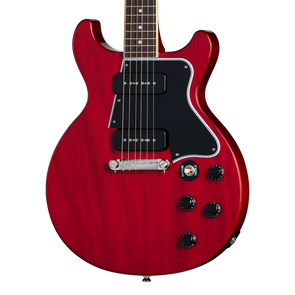 Cherry red electric guitar with a double-cutaway body, two black pickups, four black control knobs, and a black pickguard.