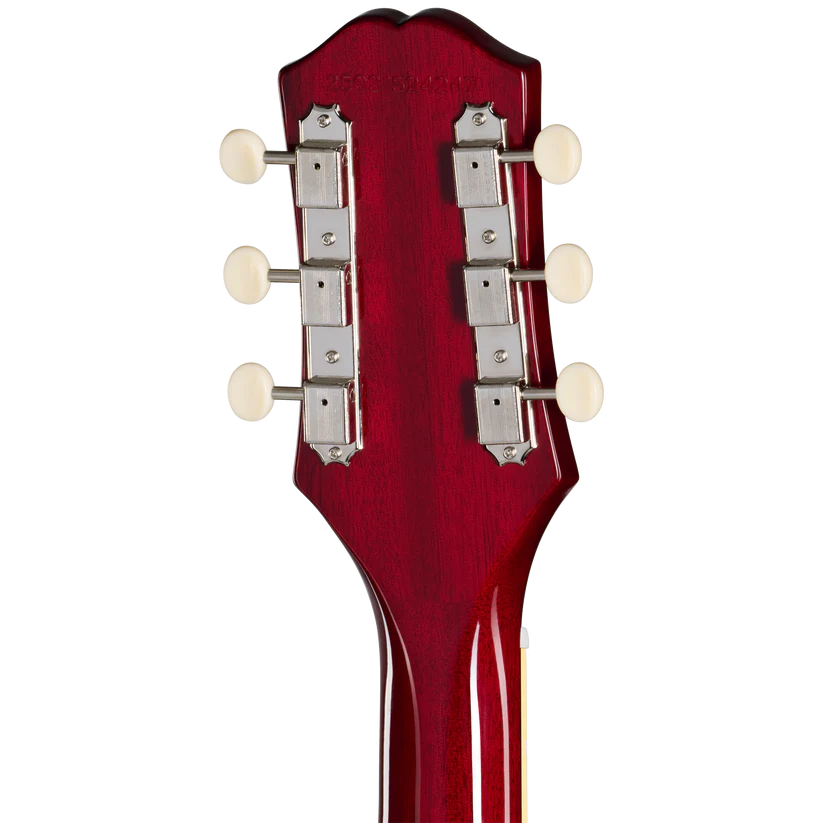 Back view of a red electric guitar headstock with six cream tuning pegs and chrome tuning machines, showing the wood grain finish.