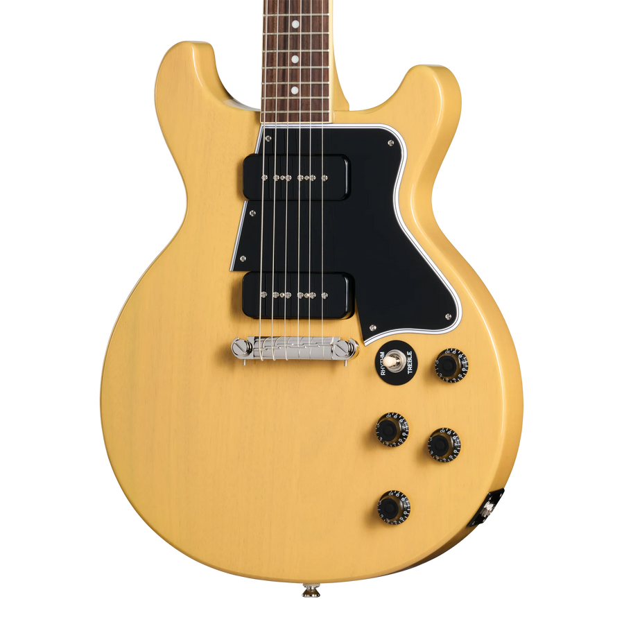 Cream-colored electric guitar with a double-cutaway body, two black pickups, black pickguard, four black control knobs, and a silver bridge.