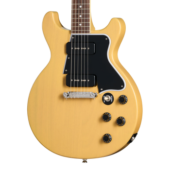 Cream-colored electric guitar with a double-cutaway body, two black pickups, black pickguard, four black control knobs, and a silver bridge.