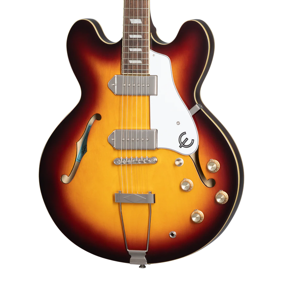 Sunburst semi-hollow electric guitar with two pickups, chrome hardware, white pickguard, and four control knobs, featuring a double-cutaway body.