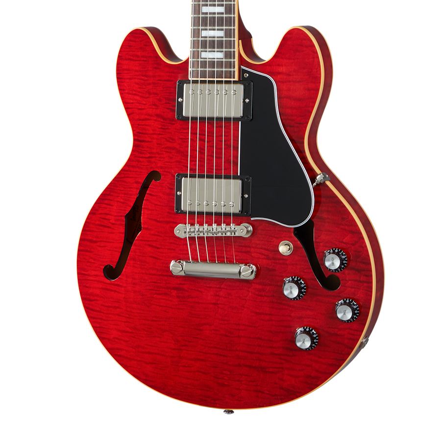 Red semi-hollow electric guitar with dual humbucker pickups, black pickguard, four control knobs, and two f-shaped sound holes on the body.