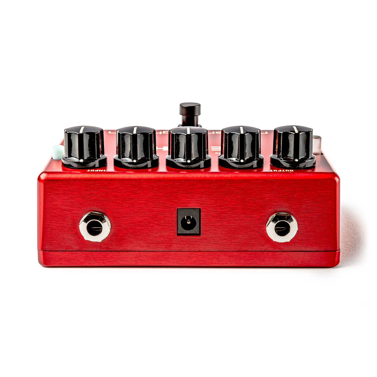 Red FX pedal with five black knobs on top, input and output jacks on the front sides, and a power adapter port in the center.