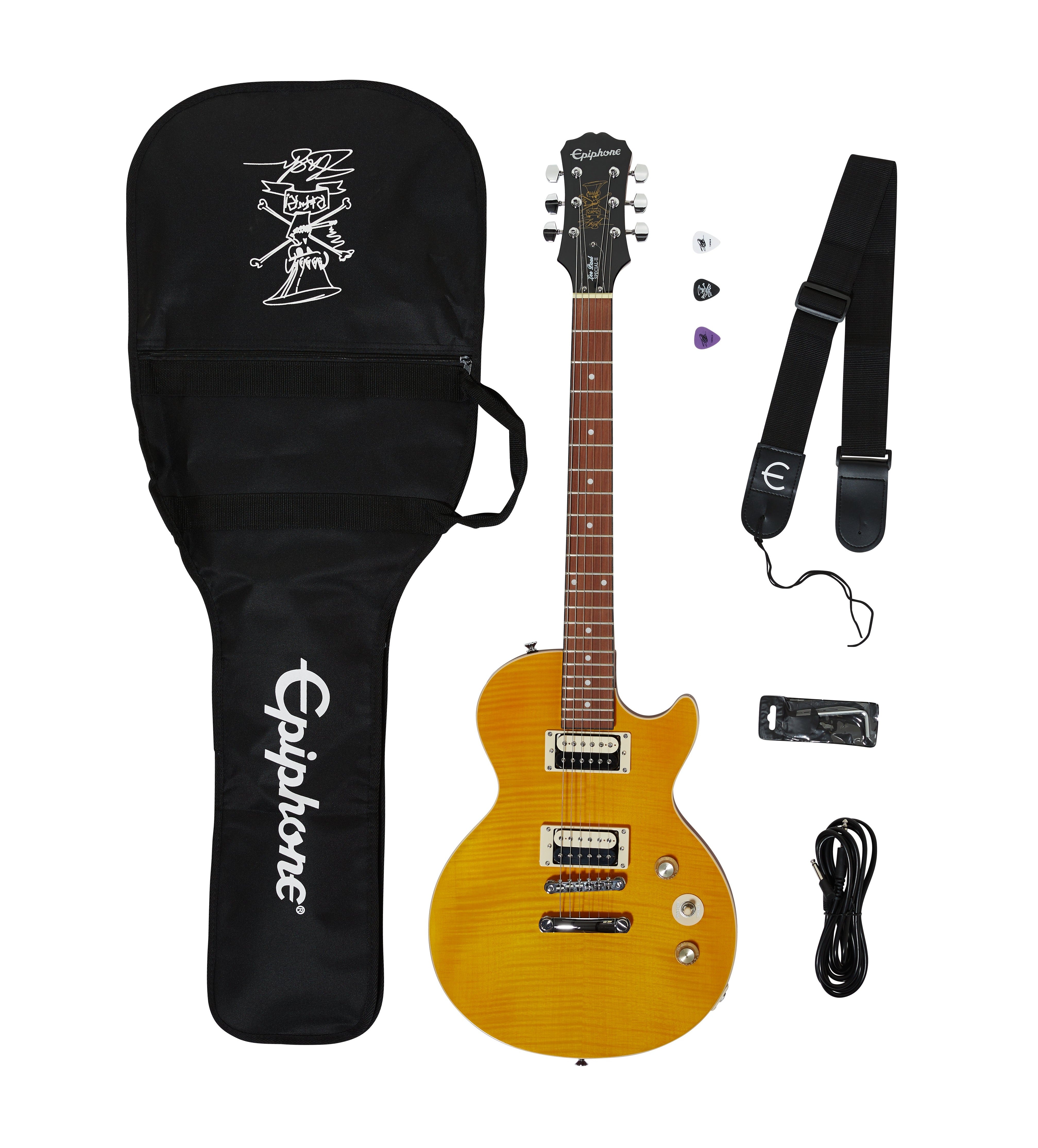Yellow electric guitar kit with gig bag, strap, cable, three picks, and tool, all neatly arranged on a white background.