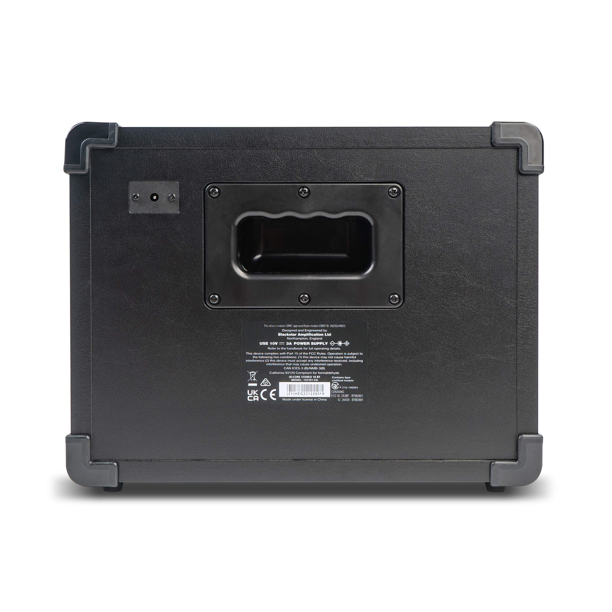 Back view of a black amplifier box with protective corner guards, a built-in carrying handle, and a label with safety and certification information.