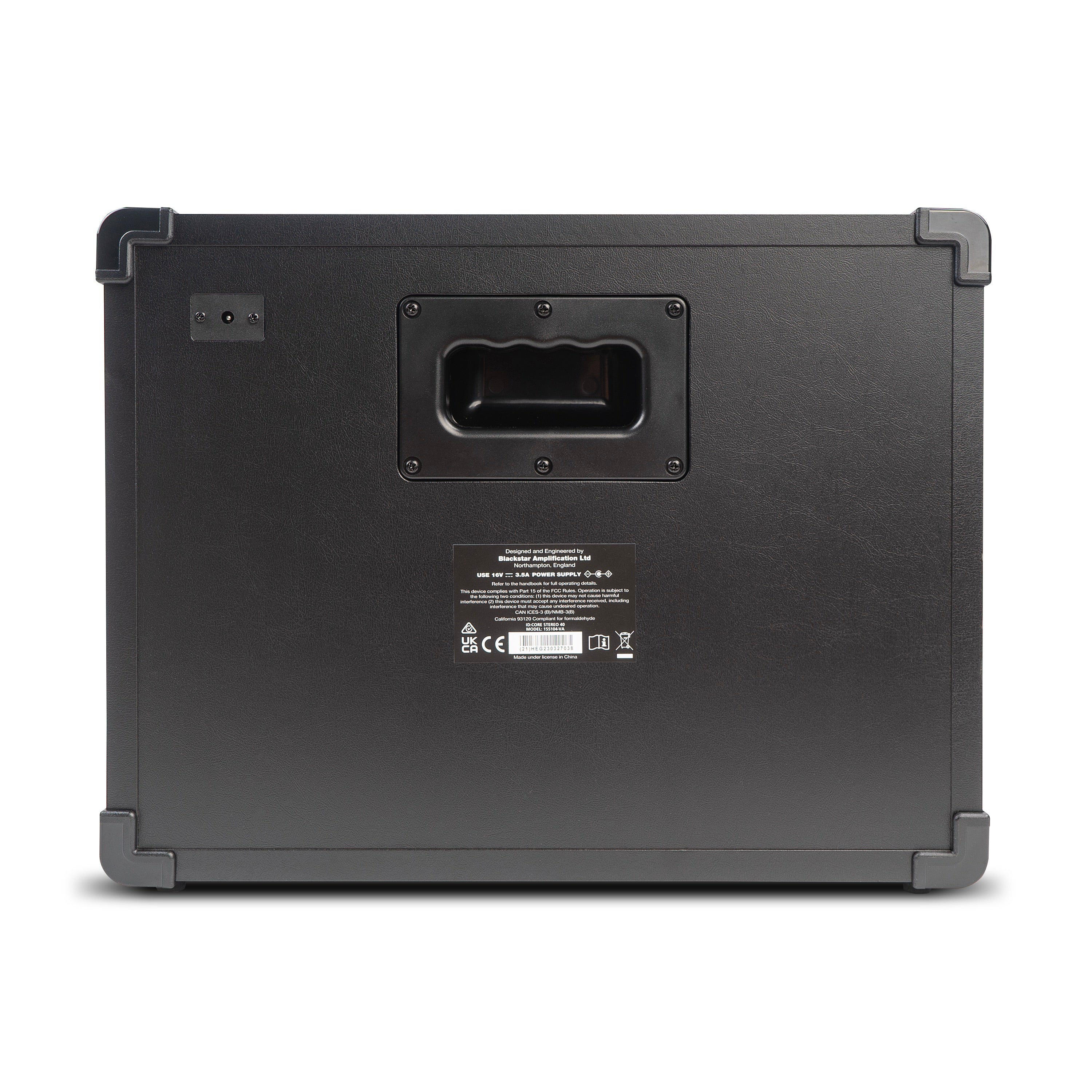 Black amplifier rear panel with a rectangular handle in the center and a label with technical information below the handle.