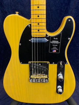 Yellow Fender American Professional II Telecaster electric guitar with a black pickguard, chrome hardware, and a maple neck.