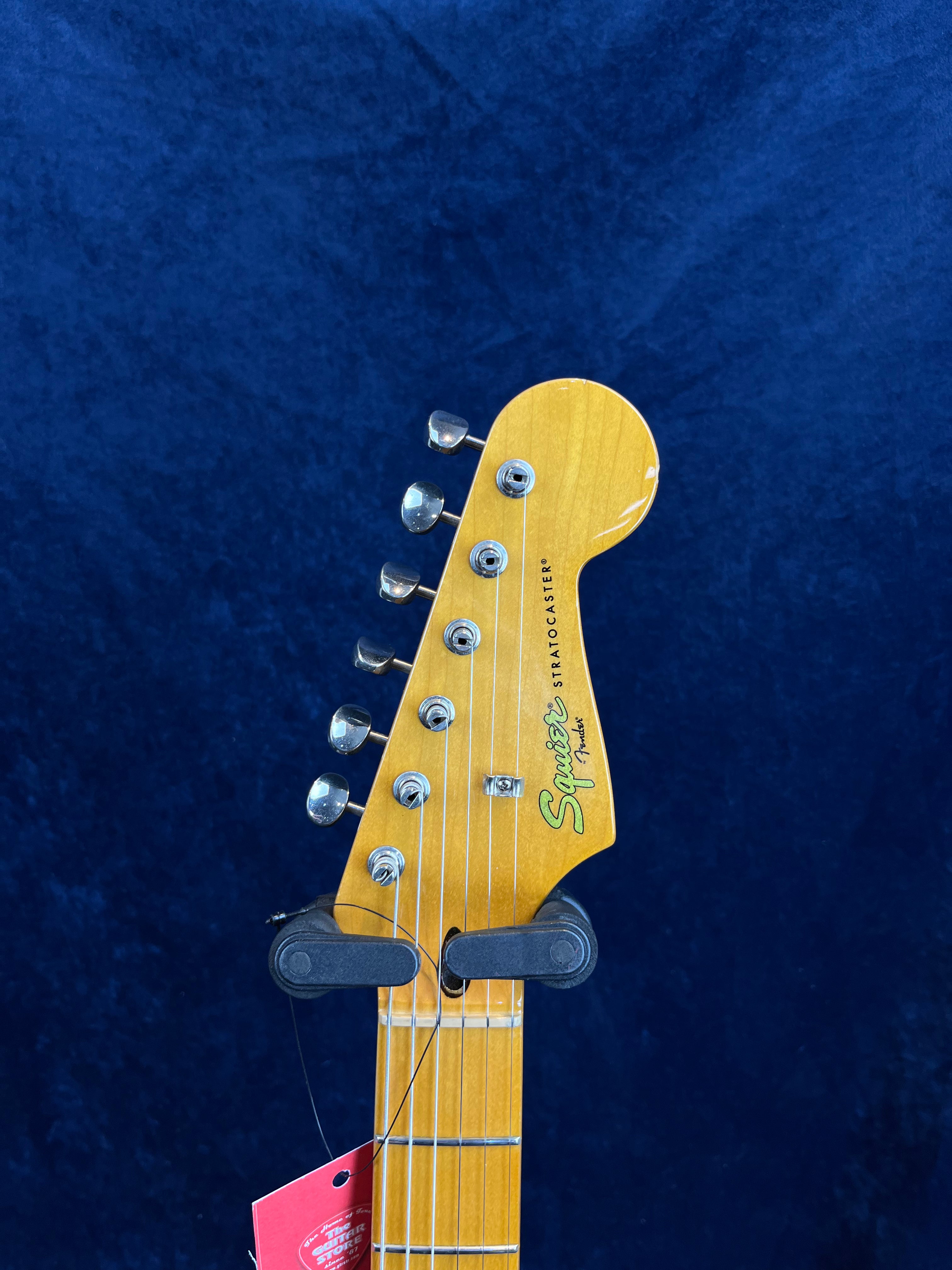 Squier Classic Vibe Stratocaster années 60, couleur Surf Green (avec wrap), d'occasion