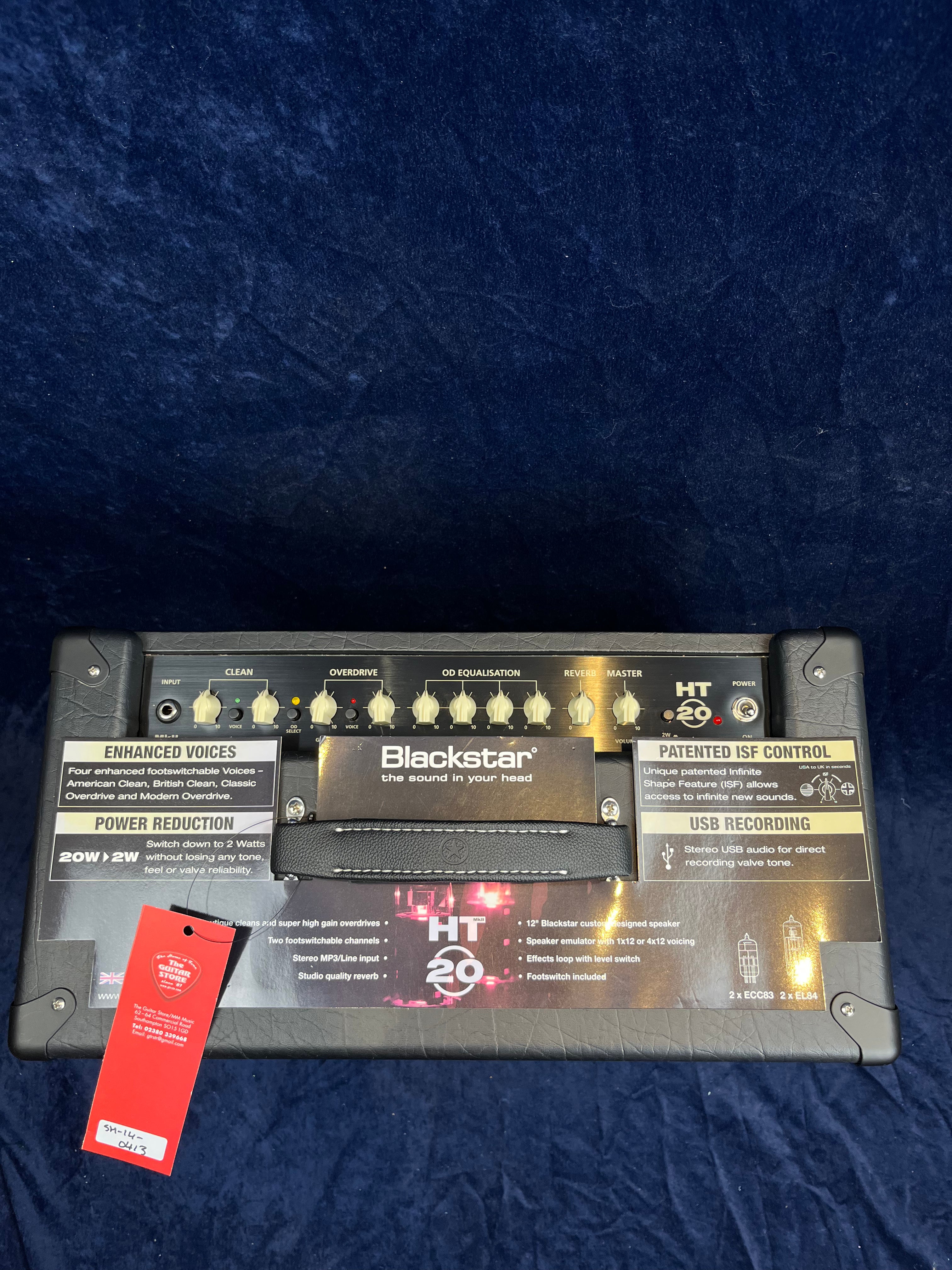 Blackstar HT-20 guitar amplifier head with multiple control knobs, labeled features like enhanced voices, ISF control, USB recording, and a carry handle.