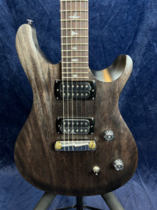 Dark wood-finish electric guitar with two humbucker pickups, two control knobs, a switch, and bird-shaped inlays on the fretboard.