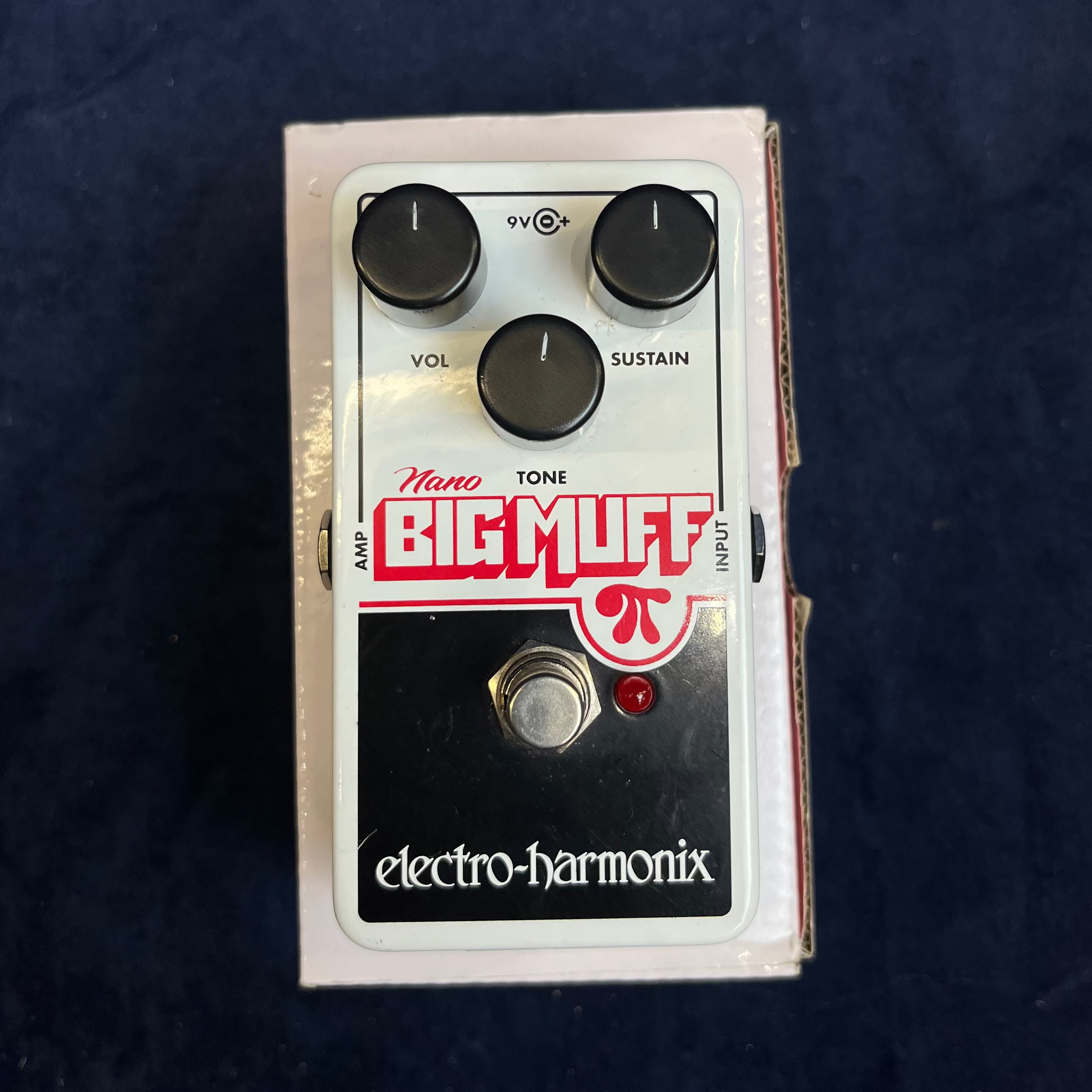 Electro-Harmonix Nano Big Muff FX pedal with three black knobs labeled Vol, Tone, Sustain, a footswitch, and a small red LED indicator.
