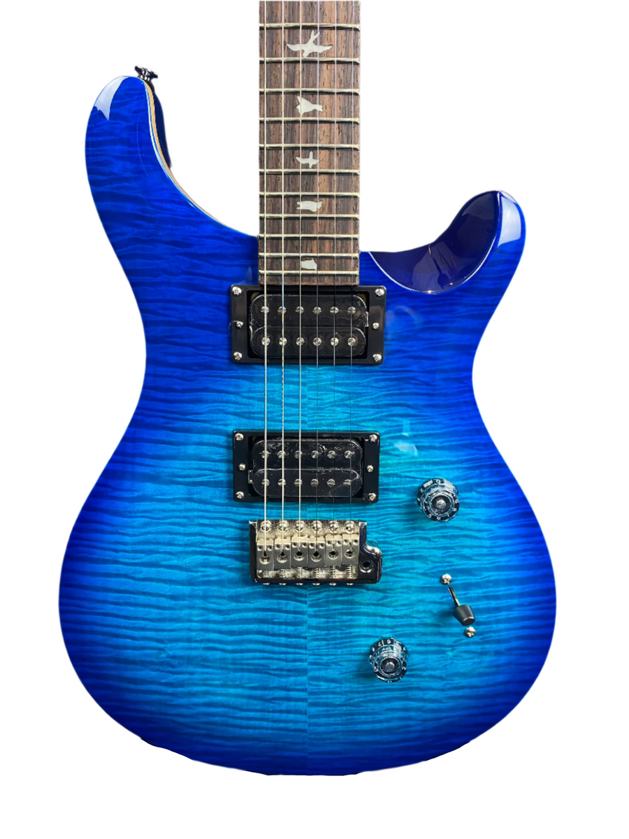 Electric guitar with a vivid blue, wavy-patterned body, dual black humbucker pickups, three control knobs, and bird inlays on the fretboard.