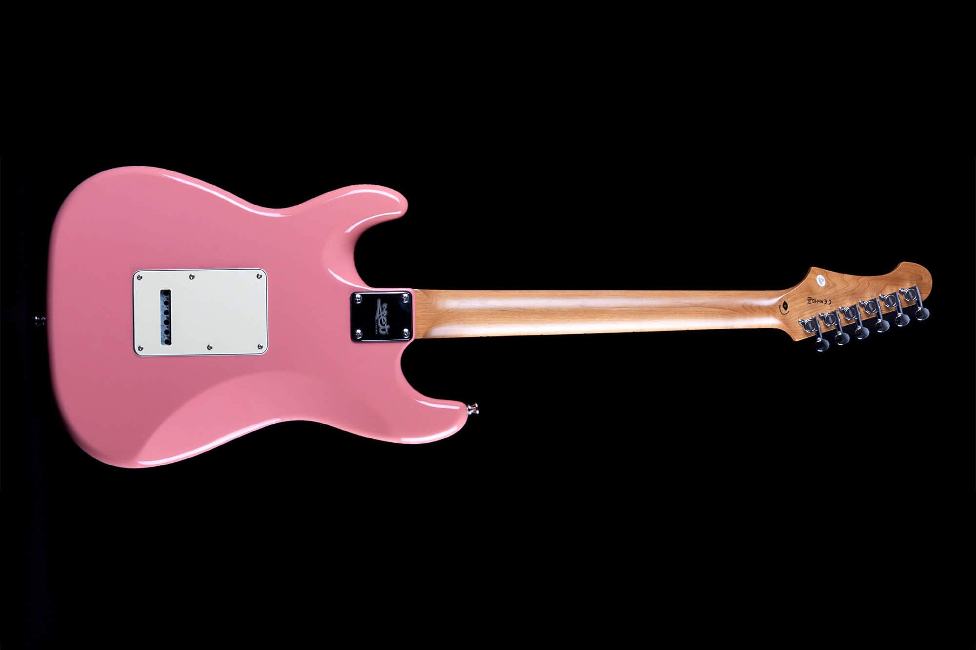 Electric guitar with a smooth pink body, natural wood neck, six tuning pegs, and a white backplate, shown from the back against a black background.