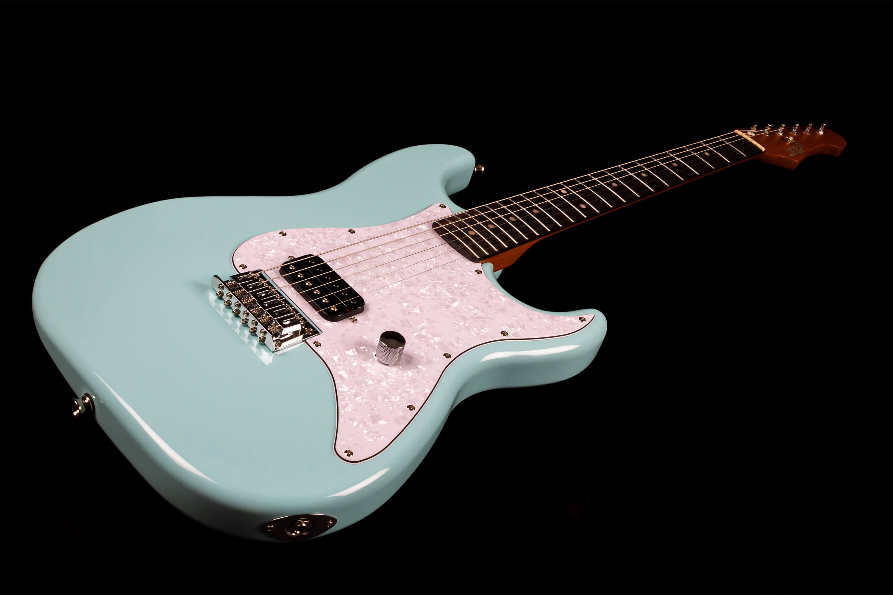 Light blue electric guitar with a white pearloid pickguard, single pickup, one knob, and a dark fretboard against a black background.