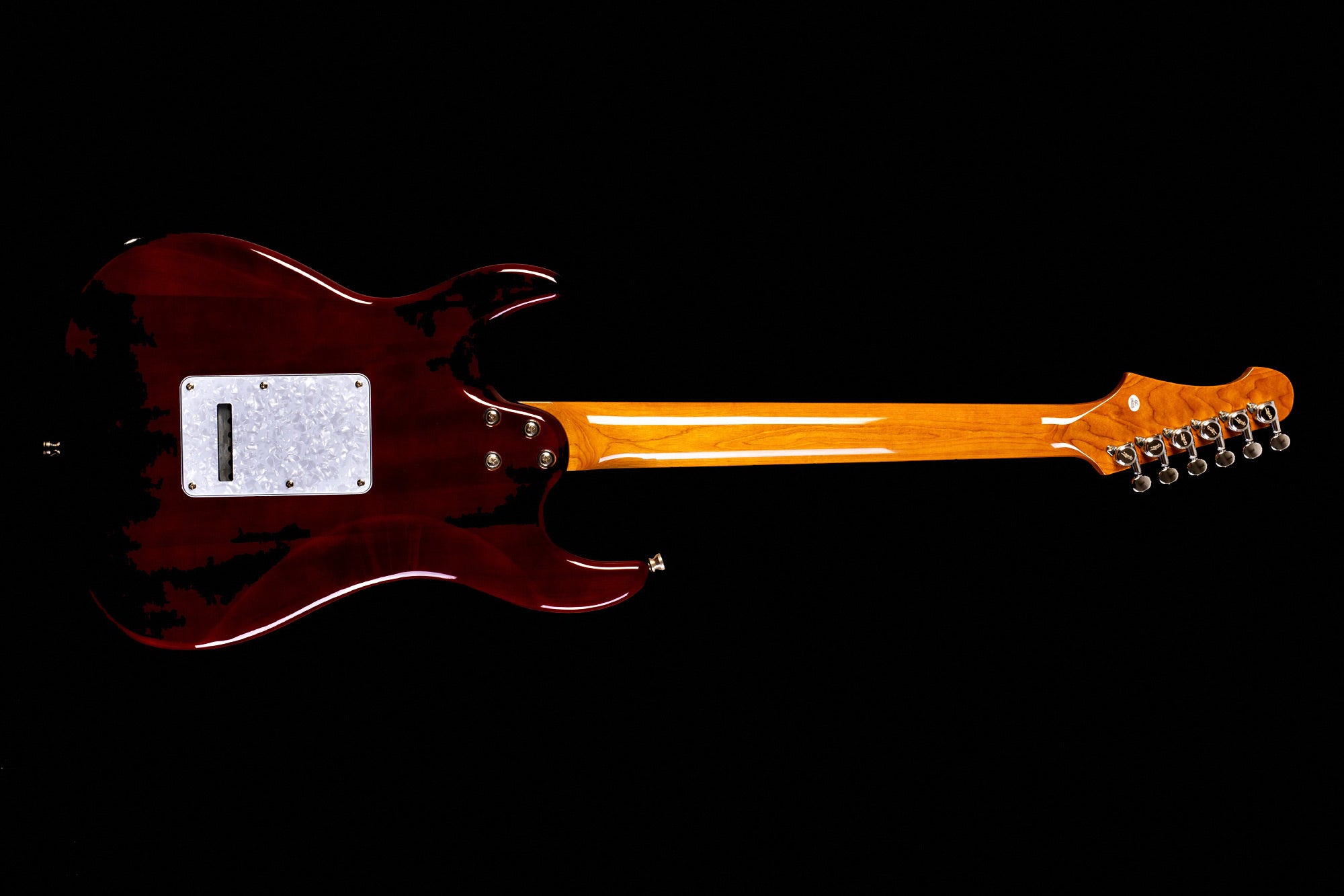 Electric guitar viewed from the back, featuring a glossy dark red body, white rectangular panel, and a light brown wooden neck with six tuning pegs.