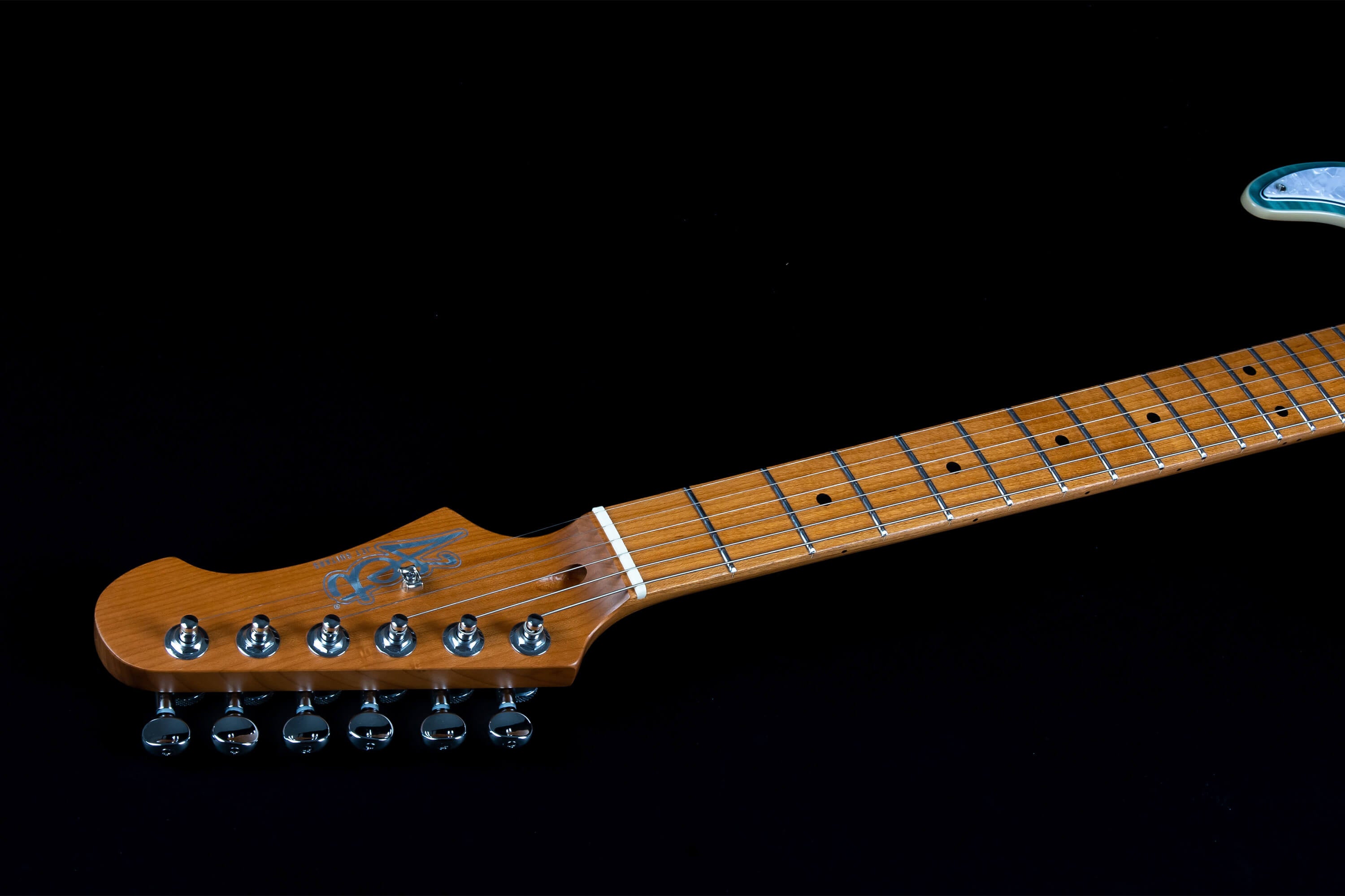 Electric guitar neck and headstock with six tuning pegs, metal frets, and dot inlays on a maple wood finish against a black background.
