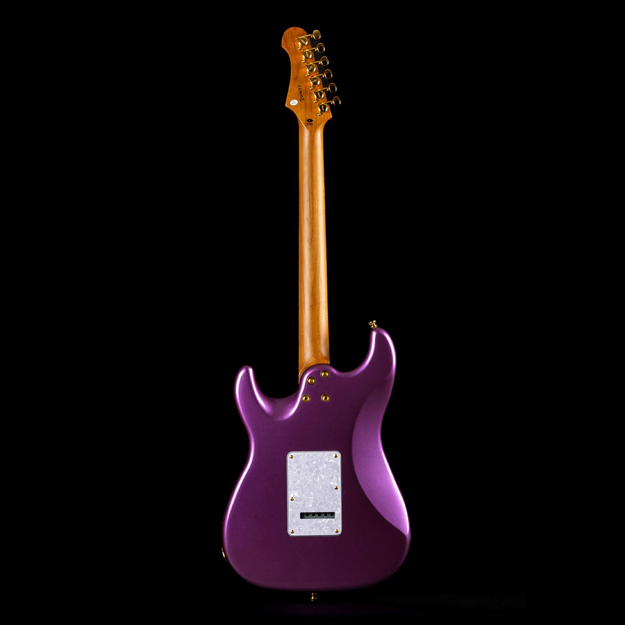 Purple electric guitar shown from the back with a wooden neck, gold hardware, and a white plastic cover plate near the base.