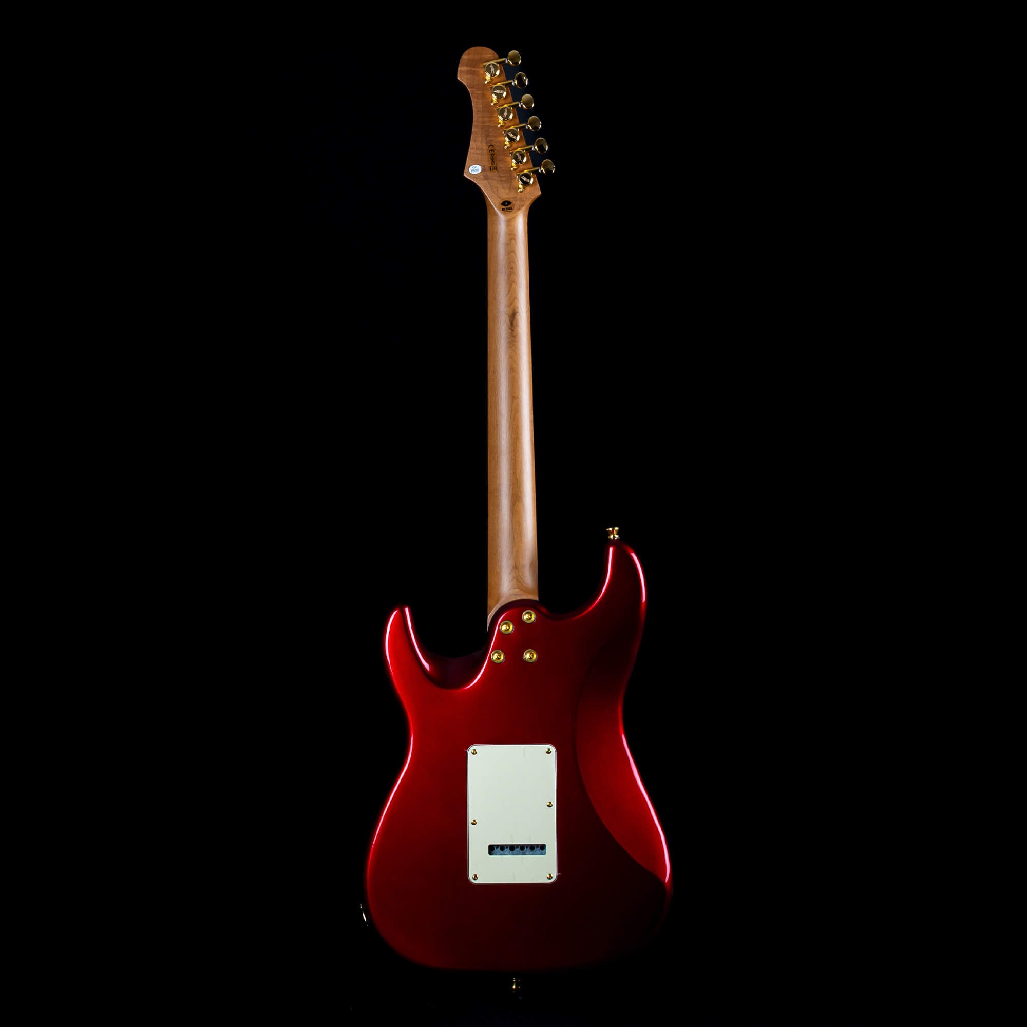 Glossy red electric guitar shown from the back, wooden neck, gold tuning pegs, white rectangular backplate, black background.