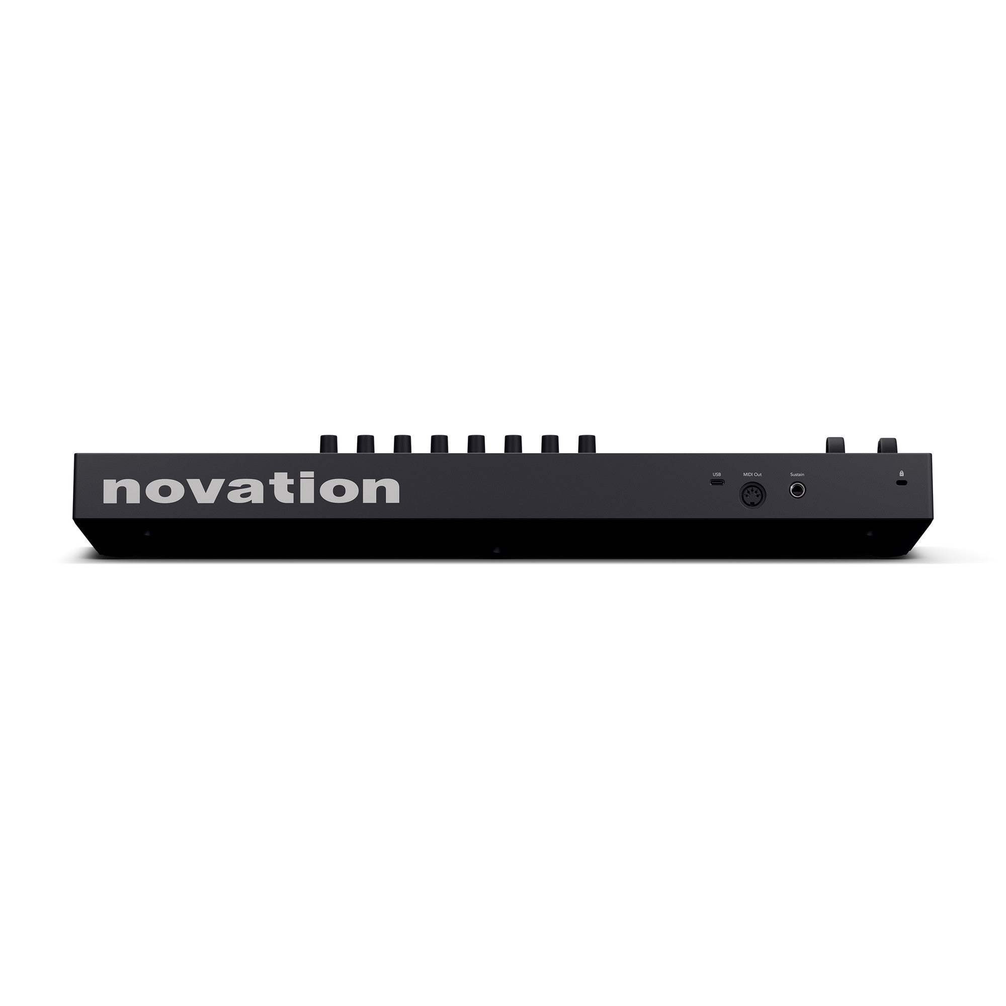 Black Novation midi controller viewed from the back, showing knobs, ports labeled USB, MIDI Out, Sustain, and the Novation logo.