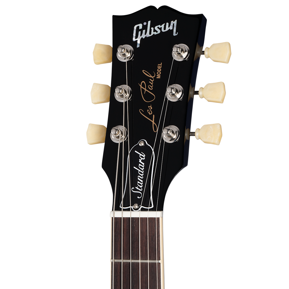 Black Gibson Les Paul electric guitar headstock with six cream tuning pegs, silver logo, and "Les Paul Standard" script.
