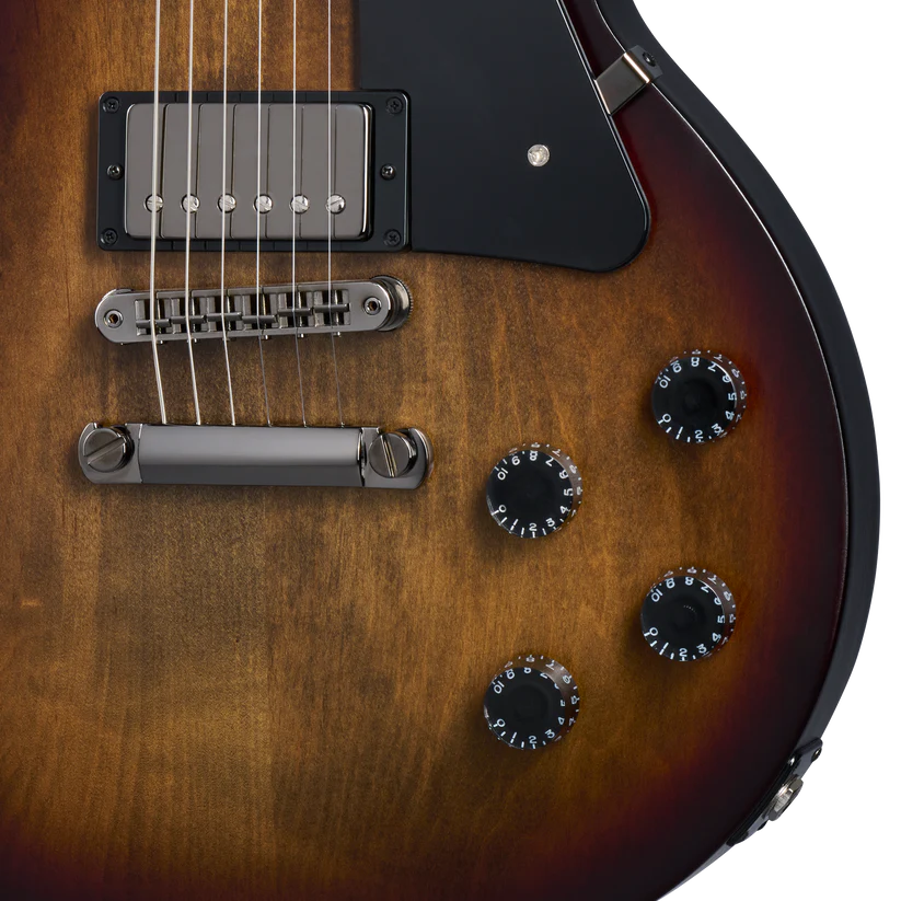 Sunburst electric guitar body showing one metal pickup, black pickguard, four black control knobs, and chrome bridge with six strings.