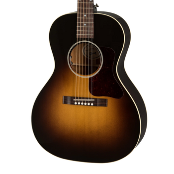Sunburst-finish acoustic guitar with a dark outer edge, lighter brown center, white trim, tortoiseshell pickguard, and six strings.