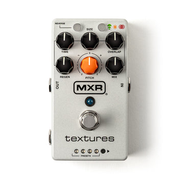 Pédale d'effets guitare MXR grise avec cinq boutons noirs, un bouton orange central, un interrupteur au pied et plusieurs voyants lumineux en haut.