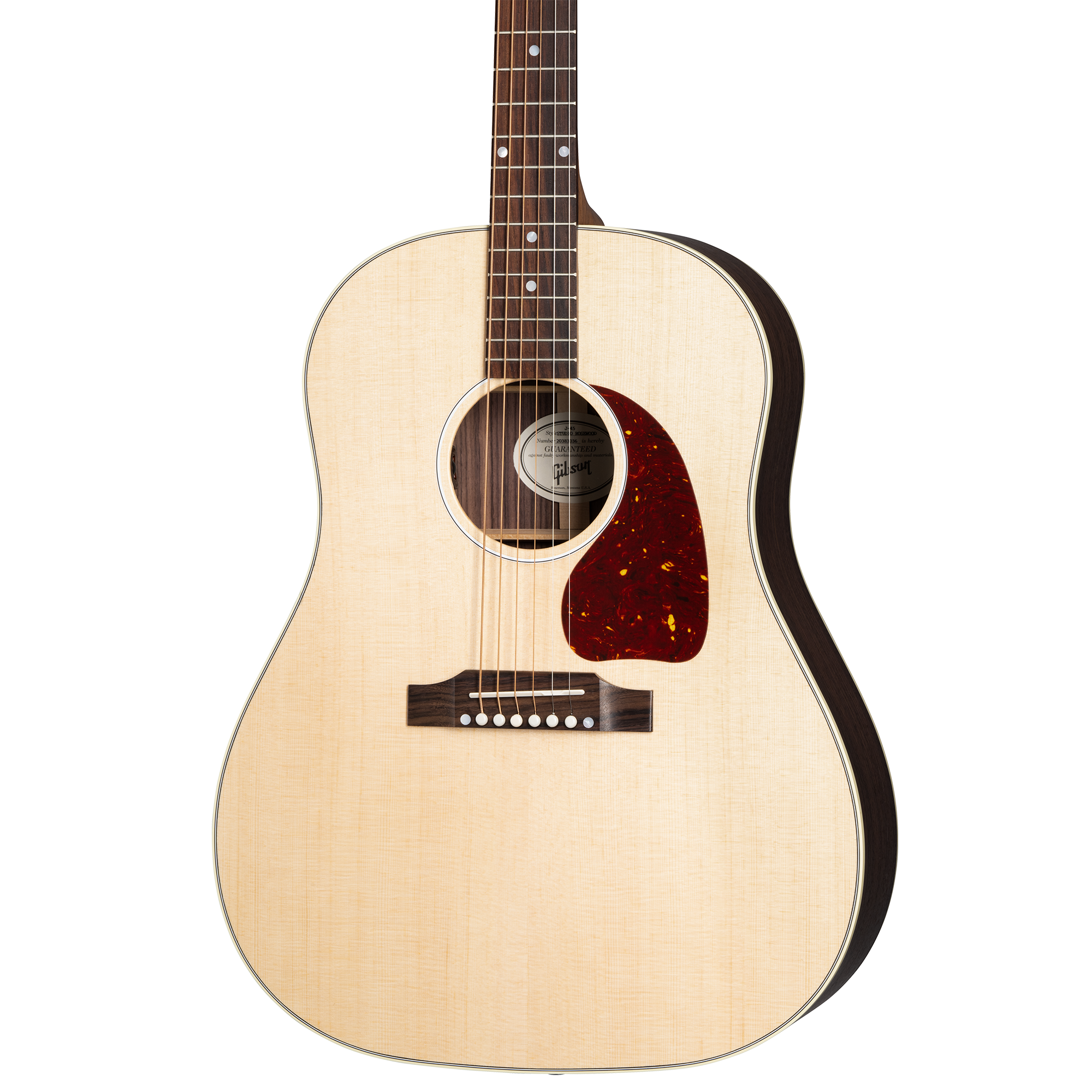 Acoustic guitar with a light wood top, dark sides, six strings, a circular sound hole, and a reddish-brown pickguard beside the strings.