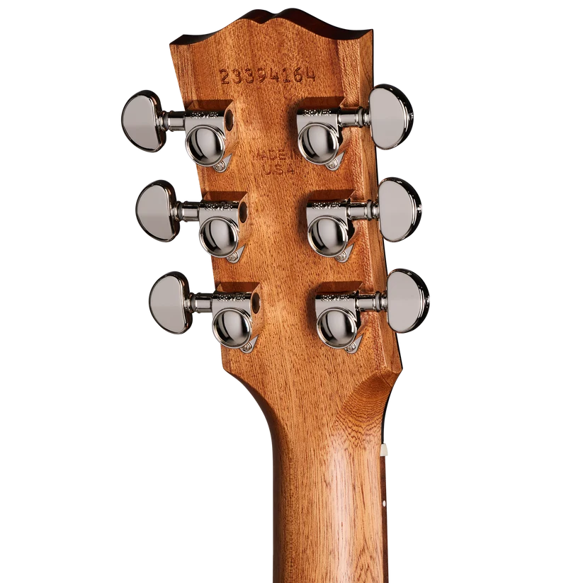 Dos du manche d’une guitare Gibson, bois marron clair avec six mécaniques chromées alignées par paires de chaque côté de la tête.