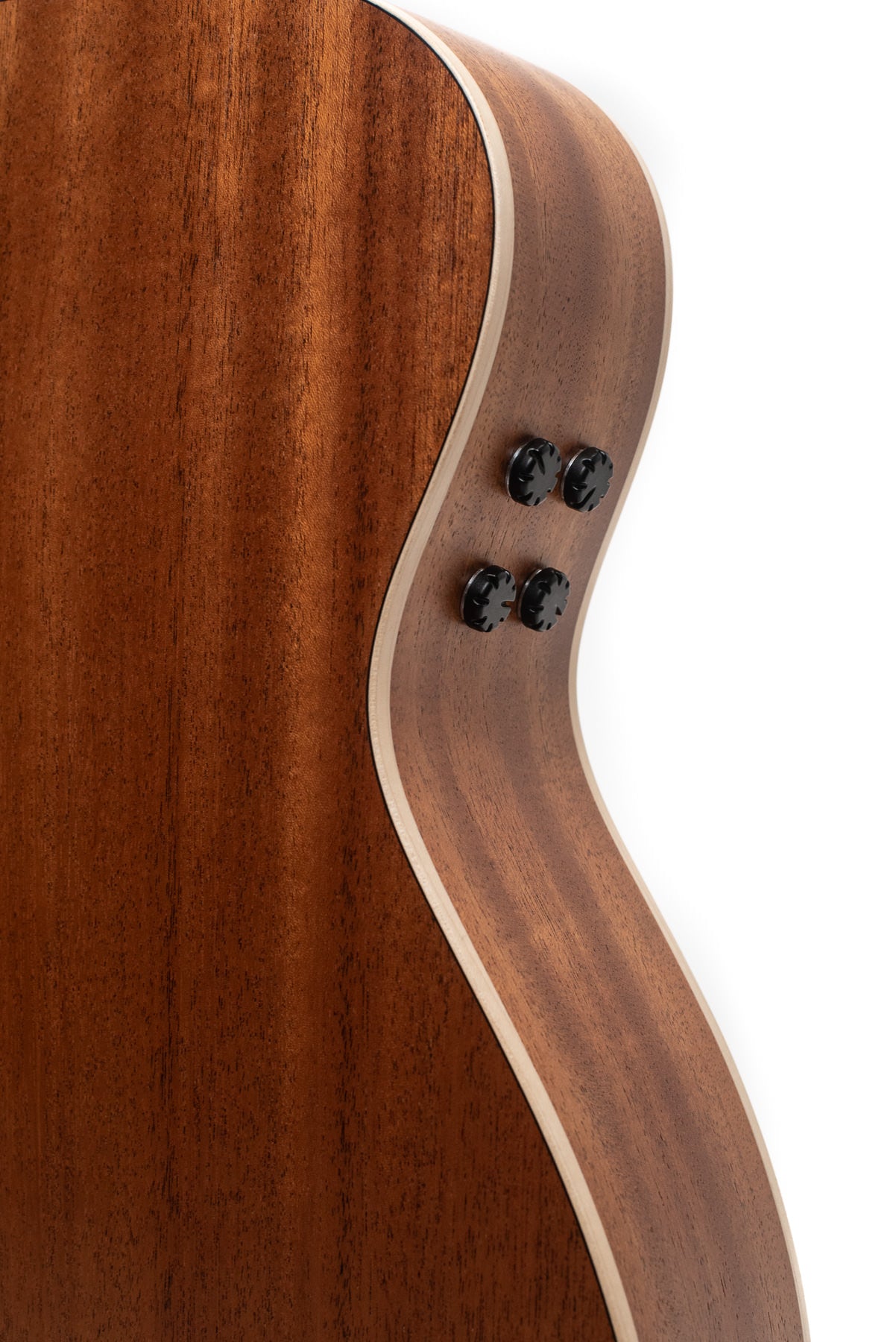 Curved wooden side of an acoustic guitar with four black control knobs and a light-colored edge trim.