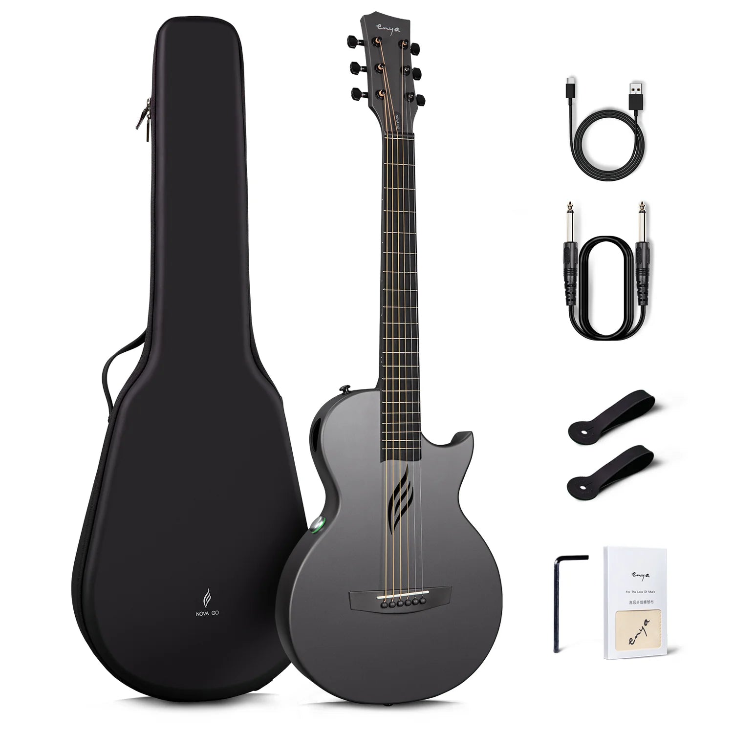 Matte black acoustic guitar with a matching hard case, two cables, two black strap buttons, hex wrench, and a user manual shown beside it.