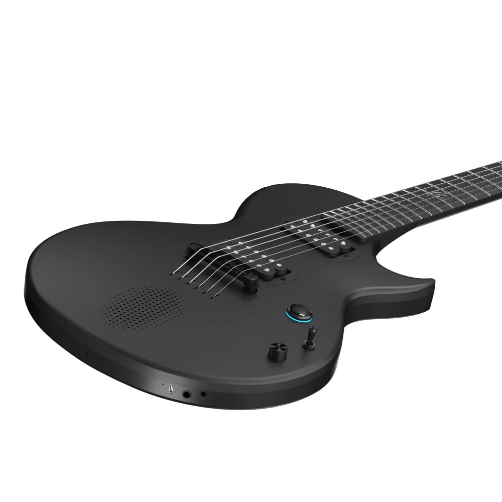 Matte black electric guitar with six strings, built-in speaker, multiple knobs and switches, and a USB port on the lower edge.