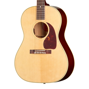Acoustic guitar with a light-colored top, dark brown sides, white binding, tortoiseshell pickguard, and six steel strings crossing a wood bridge.