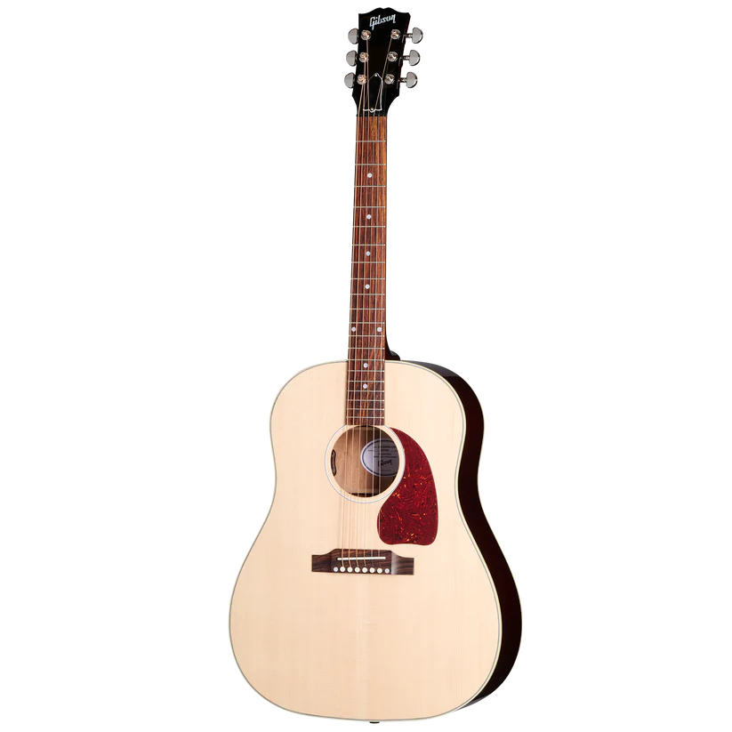 Acoustic guitar with a light-colored body, dark sides, six strings, a brown neck, and a red pickguard next to the sound hole.