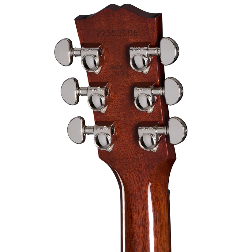 Tête de guitare électrique en bois marron avec six mécaniques chromées alignées, inscription "Made in USA" et numéro de série gravés.