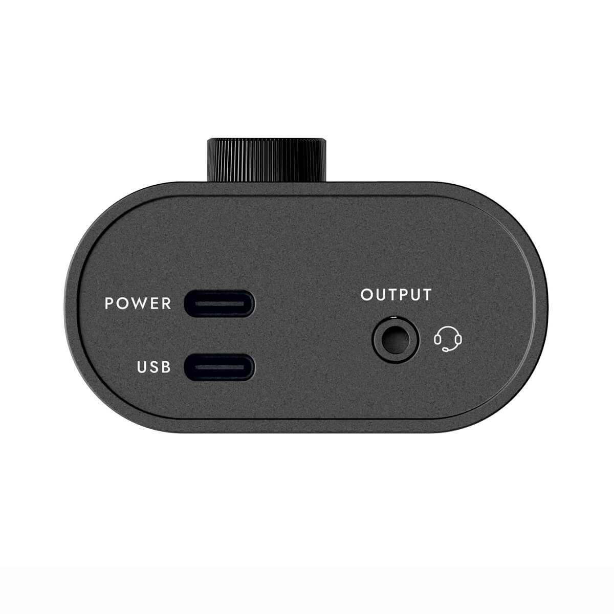 Black audio interface with two USB-C ports labeled Power and USB, plus one headphone output jack labeled Output on the front panel.