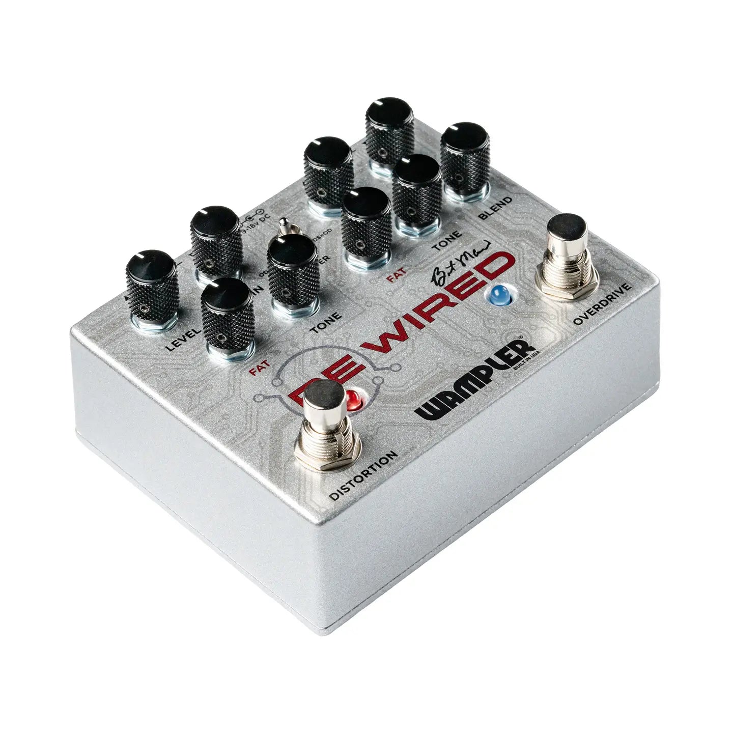 Wampler De-Wired FX pedal with nine knobs, two footswitches labeled Distortion and Overdrive, and a small toggle switch on a silver box.