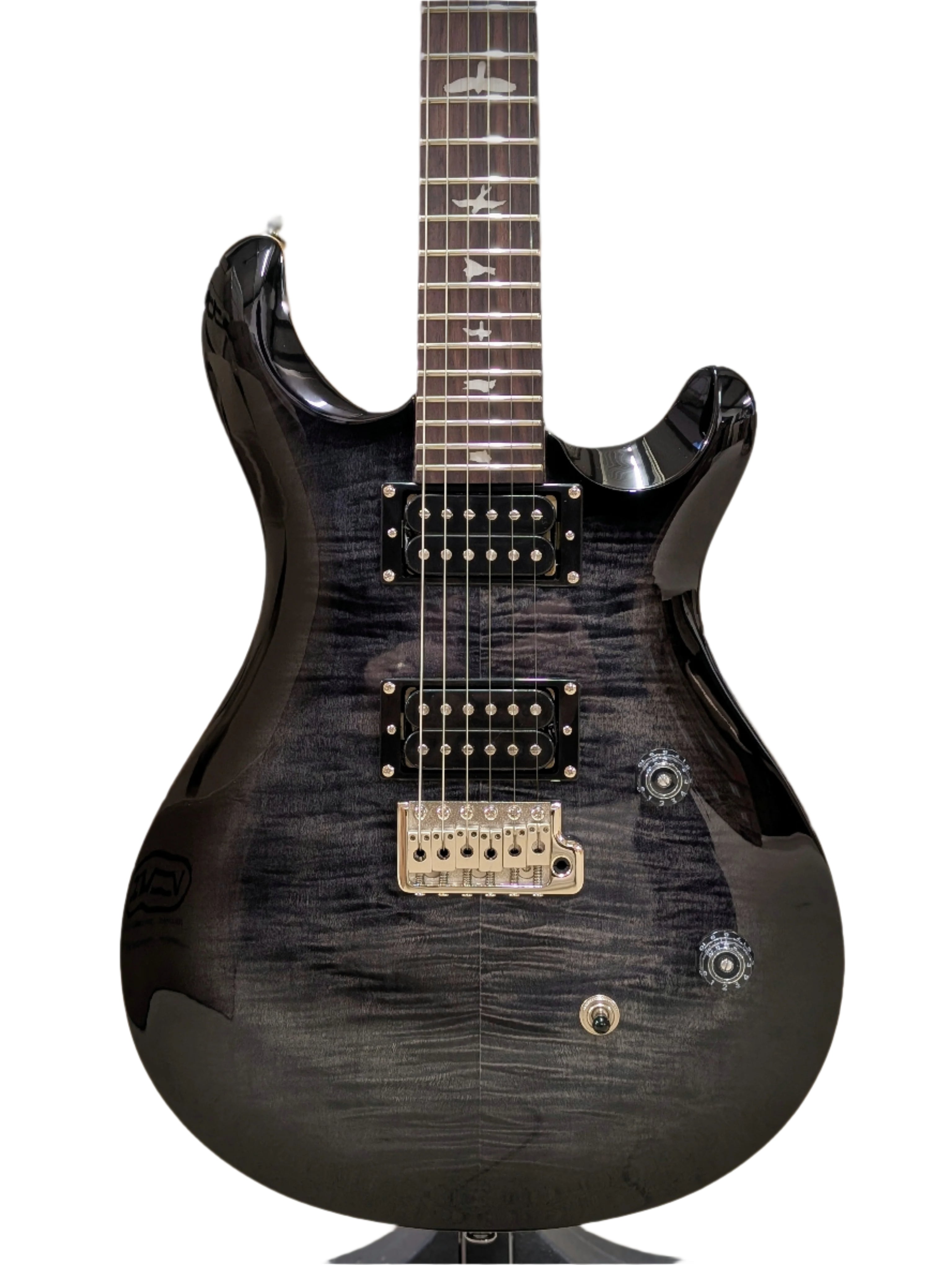 Black and grey electric guitar with a glossy, wavy wood grain finish, two humbucker pickups, three knobs, and bird-shaped inlays on the fretboard.
