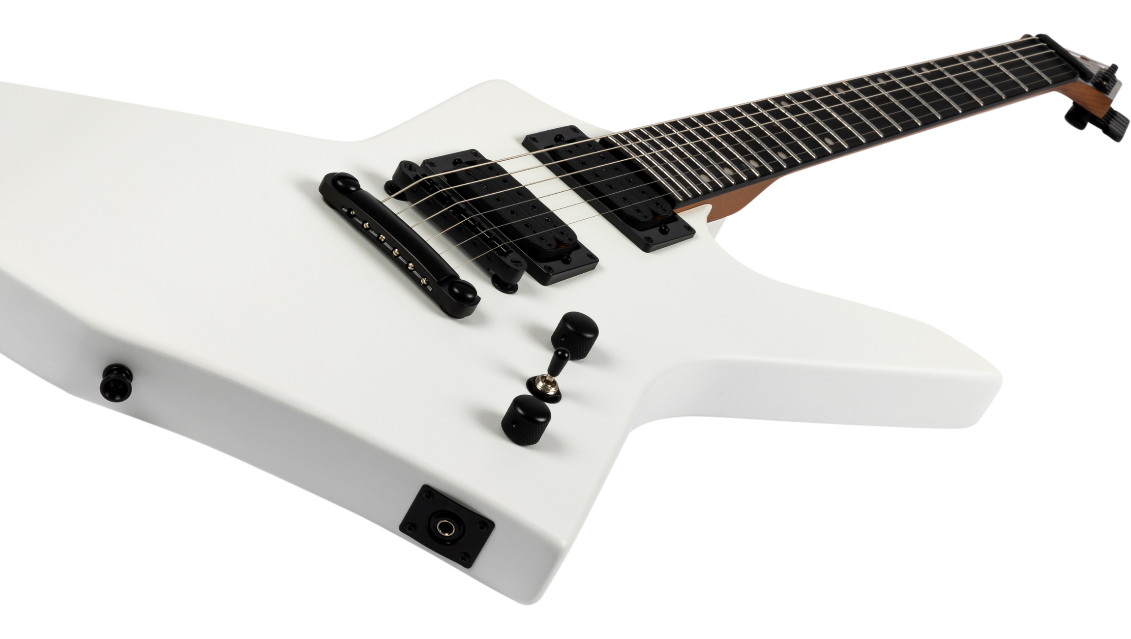 Matte white electric guitar with a sharp, angular body, two black humbucker pickups, three black control knobs, and a fixed black bridge.
