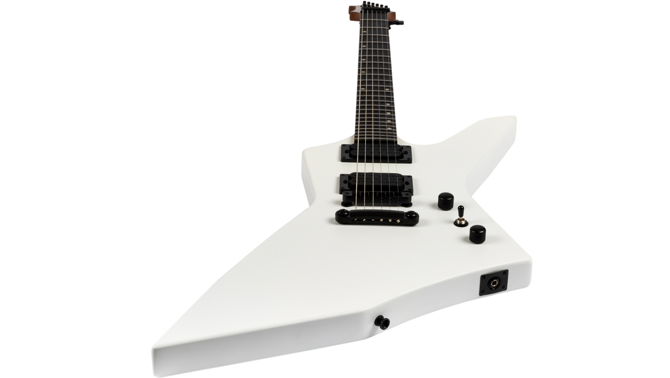 White electric guitar with a sharp, angular body, black pickups, two knobs, a switch, and a 6-string neck.